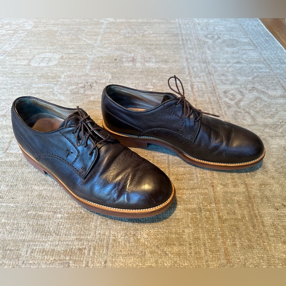 Tod’s leather lace-up shoes in dark brown